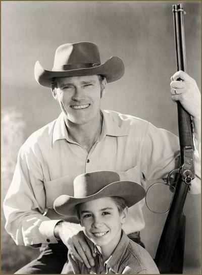 Chuck Connors as the Rifleman and Johnny Crawford as Mark McCain